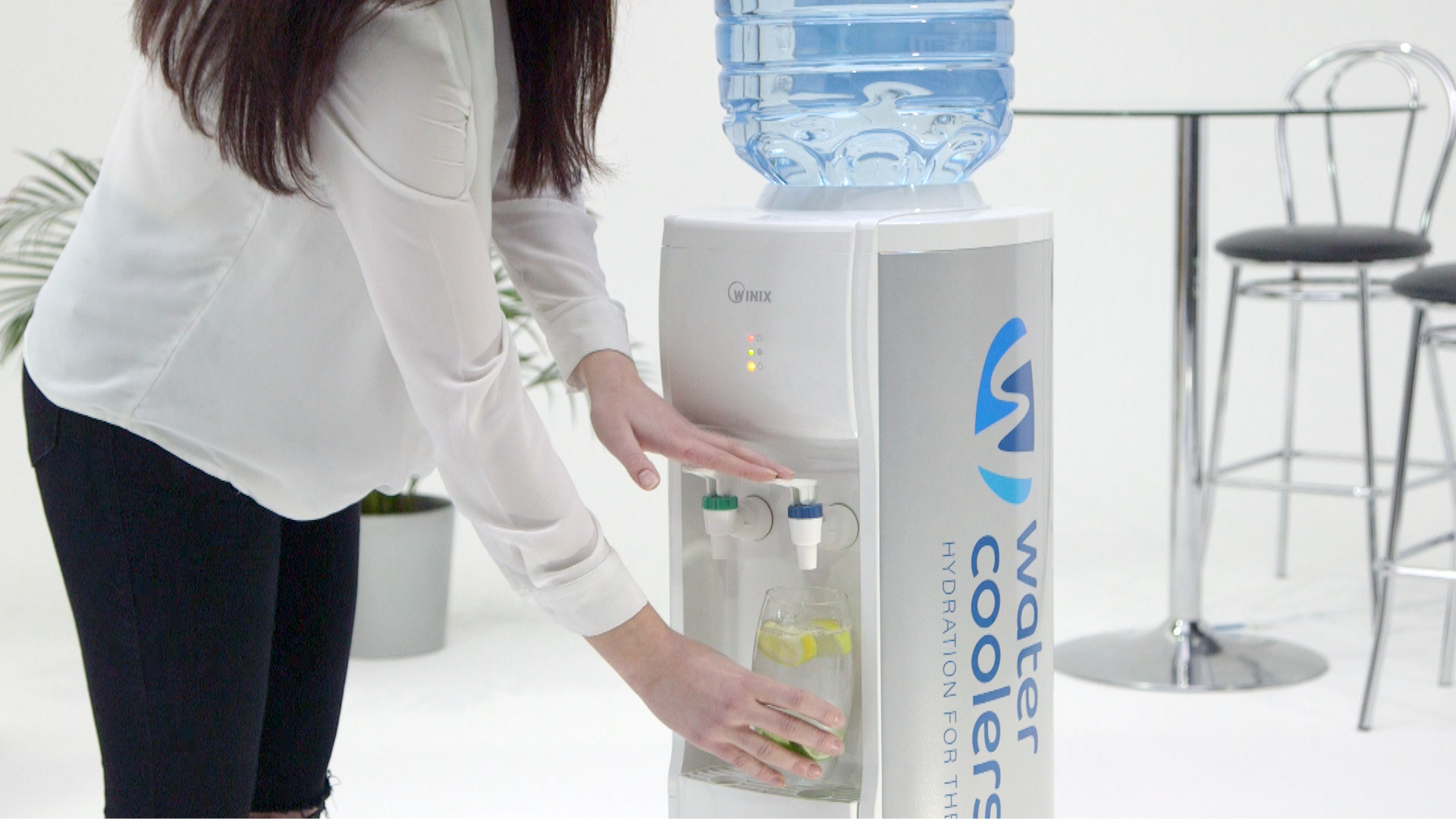 white water cooler with glass